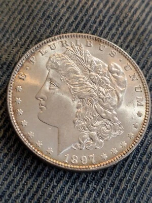 1897 Morgan Silver Dollar 1$   Uncirculated Some Edge Toning - Image 1 of 4