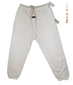 Neu mit Etikett FOG Fear of God Essentials Cloud Dance spitz zulaufende Jogginghose Sweatpants Small - Bild 1 von 9