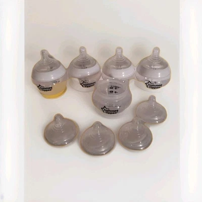 Tommee Tippee 5oz Bottles- 5 Bottles /8 Nipples/ 4 Rims Clear- White Rims 17 TTL - Image 1 of 4