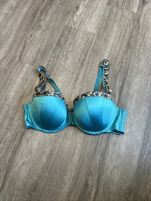 Sujetador 40D acolchado con aros Cacique para mujer verde azulado con ribete estampado animal Foto 1 de 4