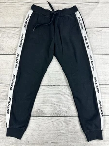 Pantalones deportivos Hollister con cordón para mujer talla pequeña con bolsillos excelentes - NEGROS - Imagen 1 de 9