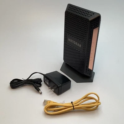 Cable módem NETGEAR CM1100 DOCSIS 3.1, 2 puertos Ethernet, usado con adaptador de CA Foto 1 de 4