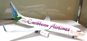 1/100 SCALE SKYMARKS SUPREME CARIBBEAN AIRLINES BOEING 737-8 SKR8232 REG#9Y-KIN - Picture 1 of 12