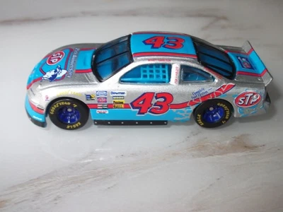 RACING CHAMPIONS 1996 BOBBY HAMILTON STP RICHARD PETTY RACING PONTIAC 1/64 CAR - Image 1 of 4