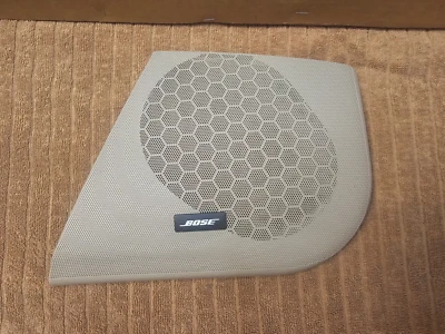 06-11 CADILLAC DTS DRIVER FRONT BOSE DOOR SPEAKER GRILLE SHALE (LT. TAN) - Image 1 of 4