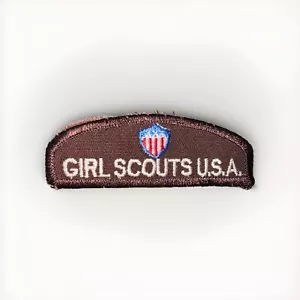 Parche con lengüeta marrón Girl Scouts USA - Imagen 1 de 2