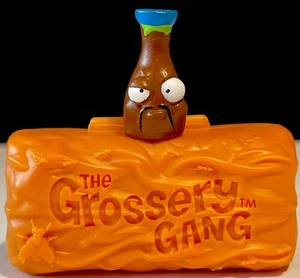 The Grossery Gang Series 1 Bad Soy Figure W/Chocolate Bar Case Tan Awful Sauces - Picture 1 of 9