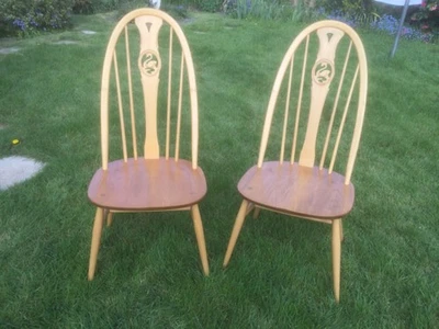 Pair of Blonde Ercol Swan back Chairs - Image 1 of 4