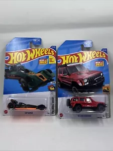 Jeep Cherokee Hot Wheels Hot Wired 2022 tira de arrastre verde y rojo 95 - Imagen 1 de 8
