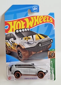 Hot Wheels Error 2023 Mud Studs Chrysler Pacifica Missing both Side Tampo - Picture 1 of 3