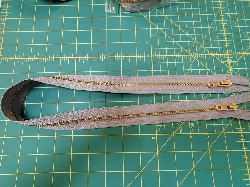 YKK 28"  Gray w/ Brass Metal Zipper Open Ended Made in USA - Image 1 of 1