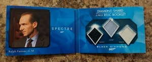 2025 James Bond 007 Black Diamond Shard 3-Piece Relic Booklet Ralph Fiennes As M - Picture 1 of 3