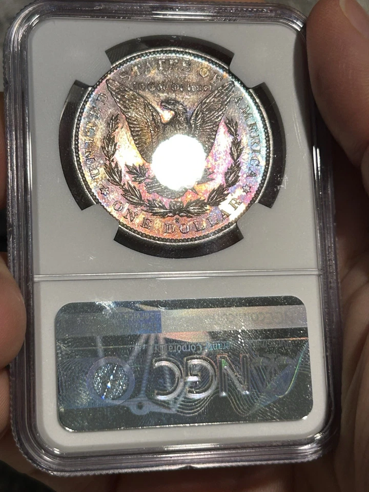 Dólar de plata Morgan 1879 S graduación profesional MS-62 TONIFICADO tono arco iris Foto 1 de 4