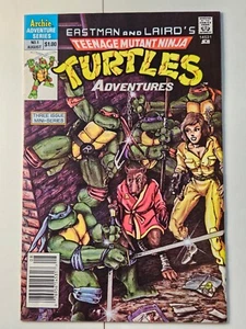 Teenage Mutant Ninja Turtles Adventures #1 -🗝️ Newsstand Edition - NM+ - Bild 1 von 7