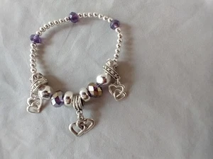 7" GEGLIEDERTES HERZEN STRETCH ARMBAND ~ LIEBE ~ LILA KRISTALLE ~ SILBERFARBEN ~ HOCHZEIT - Bild 1 von 5