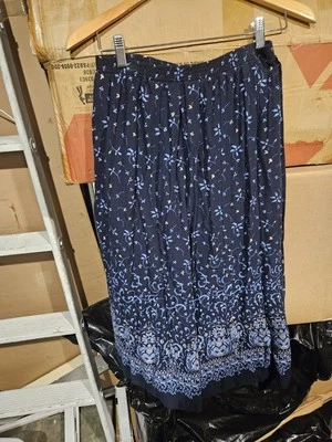 Falda para mujer Liz Baker Essentials Petite M plisada línea A tiro alto azul floral Foto 1 de 4