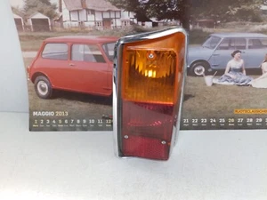 AUSTIN MINI MINOR DEL 60 - FANALE POSTERIOR DX ORIGINALE LUCAS CON DIFETTO - Imagen 1 de 4