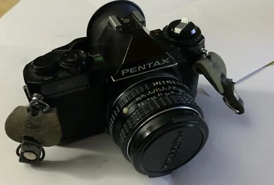 Cámara SLR Pentax MV 35 mm con lente SMC Pentax M 1:2 50 mm y f/2 1:3,5/35 2 filtros Foto 1 de 4