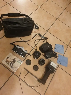 Canon AE-1 Programm,Tokina 28mm u.  35-70mm Objektive ,Blitz 370 BVC, Handbuch  - Bild 1 von 4