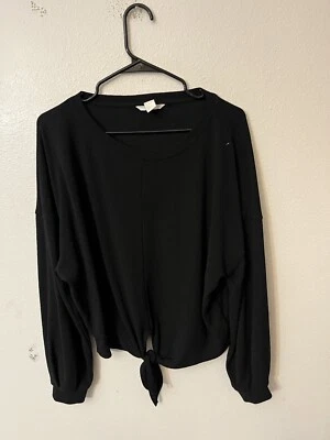 Sudadera para mujer H&M grande negra manga larga anudada frontal cuello redondo Foto 1 de 4