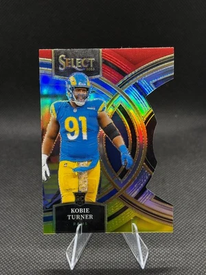 2023 Select Football - Kobie Turner, LA Rams - Red/Yellow Prizm Die-Cut, Premier - Image 1 of 2