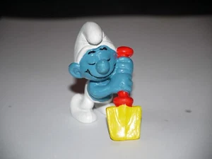 PEYO FIGURINE SCHTROUMPF S'ENDORT SUR LA PELLE  - Imagen 1 de 3