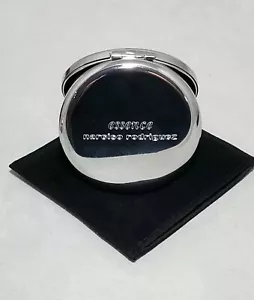 ESSENCE-NARCISO RODRIGUEZ ARGENTO SPECCHIO DOPPIO LATO COMPATTO/NERO BORSA VELLUTO - Foto 1 di 2