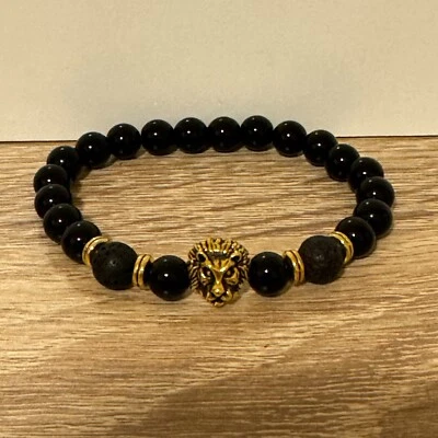 Pulsera de lujo King Lion elástica dorada negra para hombre Foto 1 de 4