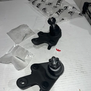 Par de rótulas inferiores delanteras TRQ lados izquierdo conductor y derecho pasajero para Toyota Lexus - Imagen 1 de 5