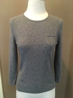 Suéter Top Express M/L 100% Gris Cachemira con Bolsillo Foto 1 de 4