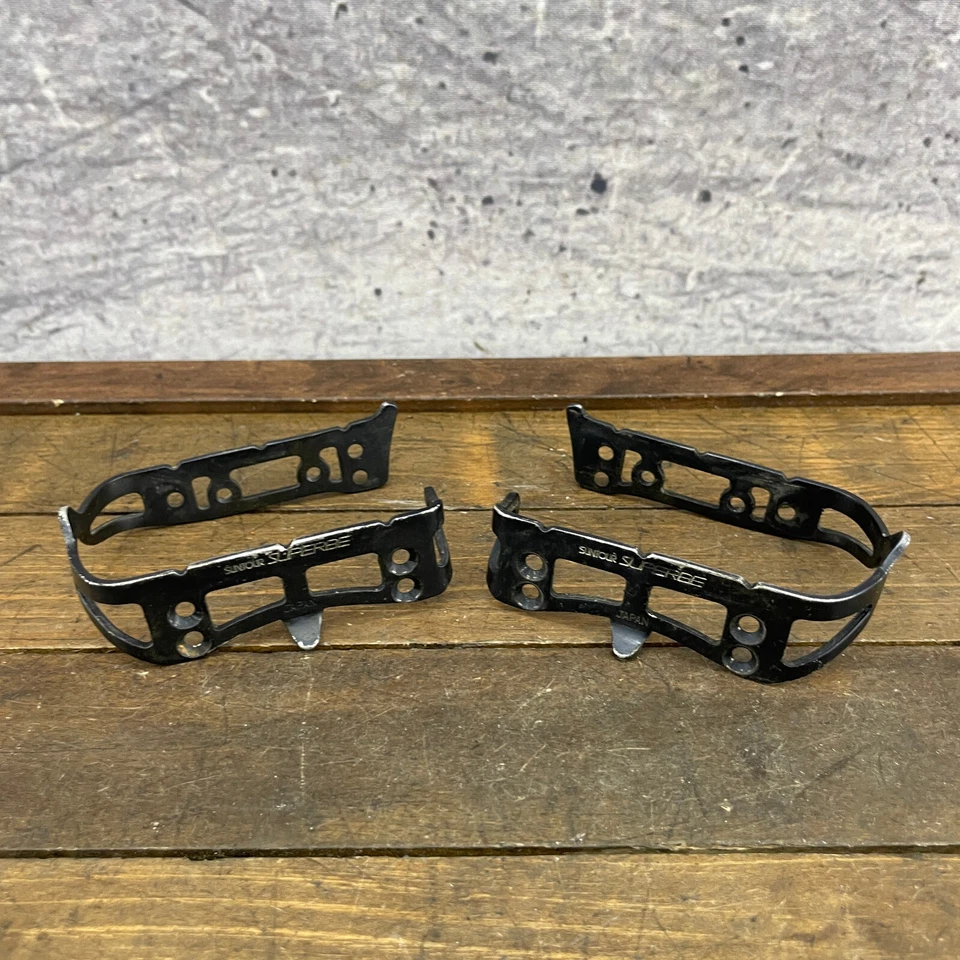 Juego de jaula de pedales Suntour Superbe de colección 7 pernos bicicleta de carreras piezas negras Eroica años 80 Foto 1 de 4