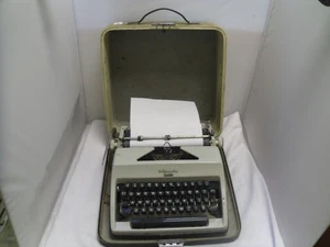 Vintage Olympia Monica typewriter - ribbon needs replacing - the case is stained - Picture 1 of 18