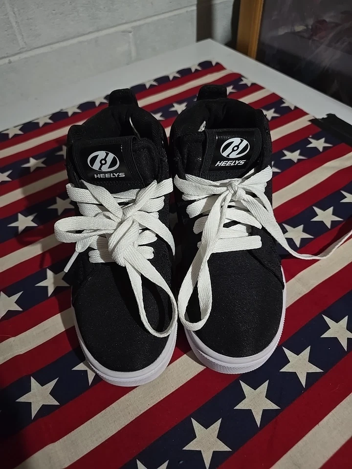 Heelys Black Skate Shoes with Wheels and Lace-Up Design - Image 1 of 4