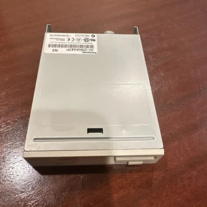 PANASONIC JU-256A347P  3.5" FLOPPY DRIVE - BEIGE BEZEL  - P/N: 13034N344076 - Picture 1 of 3