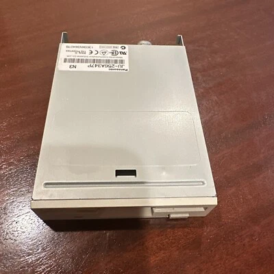PANASONIC JU-256A347P  3.5" FLOPPY DRIVE - BEIGE BEZEL  - P/N: 13034N344076 - Image 1 of 3