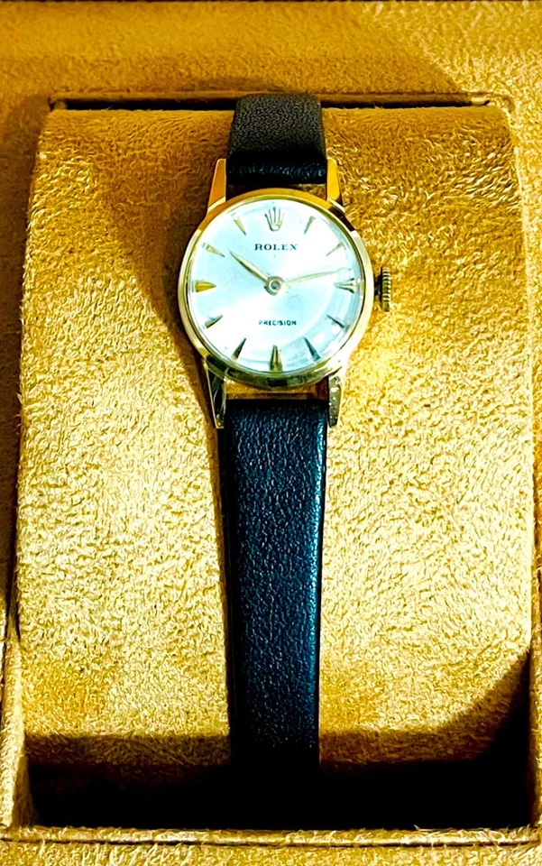 Reloj Rolex de oro amarillo de 18 quilates con esfera plateada de precisión 17J para dama, sin precio base Foto 1 de 4