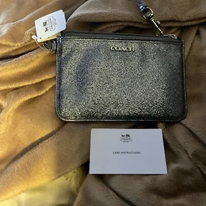 Muñequera Coach Silver Star Glitter - Nueva con etiquetas Instrucciones de cuidado Coach incluidas 50374 - Imagen 1 de 6