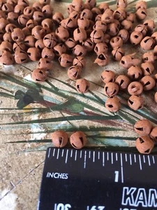 500 Primitive Rusty Tin JINGLE BELLS 6mm 1/4 in 1/4" TINY Christmas Craft Rust * - Picture 1 of 4