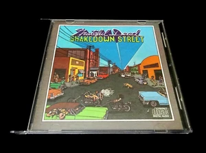 Grateful Dead Shakedown Street CD 1978 Jerry Garcia Arista Gilbert Shelton Art - Foto 1 di 12
