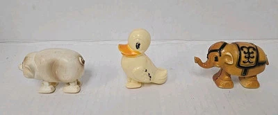 JUGUETES PARA CAMINAR DE PLÁSTICO DE COLECCIÓN CAMINANTES CERDO, PATO, ELEFANTE HECHOS EN HONG KONG Foto 1 de 4