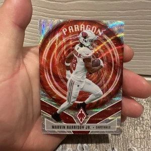 2025 Panini Phoenix Silver Wave Paragon Marvin Harrison Jr /299 Cardinals  - Bild 1 von 5