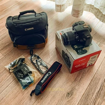 Canon EOS 1100D | SLR-Digitalkamera - Schwarz (Kit mit EF-S 18-55mm IS II) - Bild 1 von 4