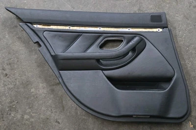 Panel de puerta izquierda conductor trasero BMW 528i E39 1997-2003 negro OEM Foto 1 de 4
