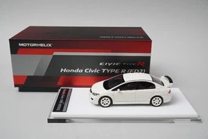 M63503 MOTORHELIX 1:64 Nissan GT-R (R35) 50 aniversario Ultimate Metal plateado - Imagen 1 de 10