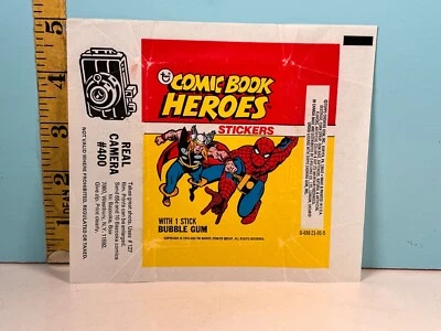 1974-75 Topps COMIC BOOK HEROES STICKERS Camera Wax Pack Wrapper🔥 - Image 1 of 2