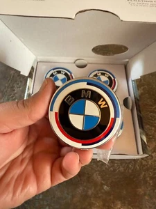 4x 56mm (2.20") BMW Floating Center Caps – 50th Anniversary M Logo - Picture 1 of 4