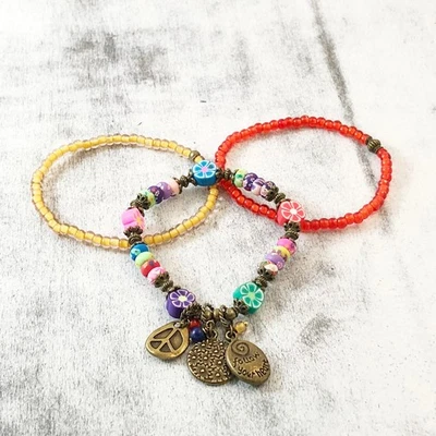 Conjunto de pulsera elástica de arcilla polimérica estampada Millefiori con flores, tres bronce Foto 1 de 4
