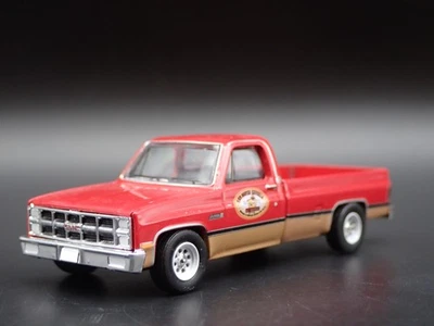 Modello Auto Diecast In Scala 1/64 GMC K2500 4X4 Pickup Truck Anno 1982 - Immagine 1 di 4