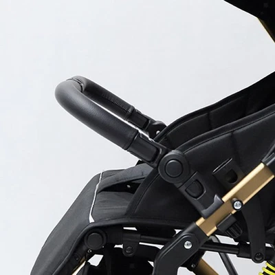 Barra de mano delantera con asa universal reposapiés para carrocito Foto 1 de 4