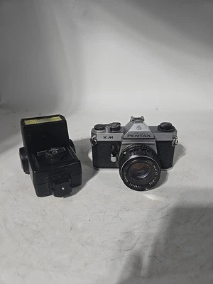 Cámara SLR Asahi PENTAX KM 35 mm con lente 55 mm 1:1,8 y tiristor automático Vivitar Foto 1 de 4